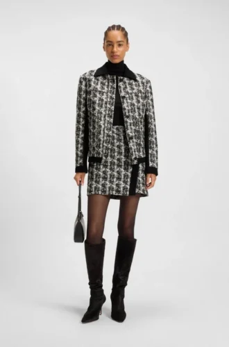Minikjol i mönstrad fjädertweed