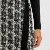 Minikjol i mönstrad fjädertweed