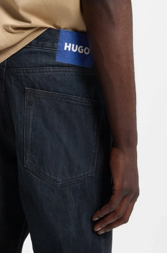 Mörkblå jeans i regular fit i stonewashed denim Mörkblå jeans i regular fit i stonewashed denim