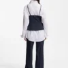 Nålstrecksmönstrad topp med peplum-fåll
