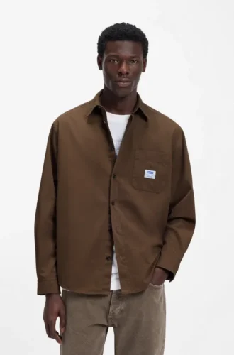 Oversized-skjorta i bomullscanvas