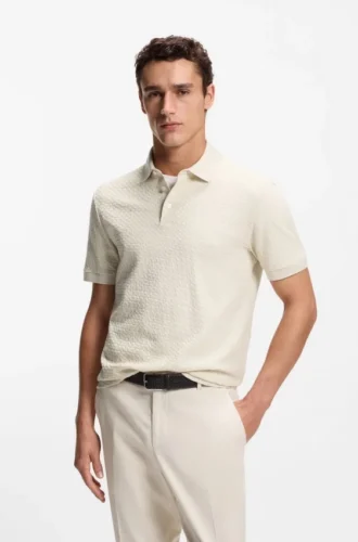 Polotröja i bomull med monogramjacquard