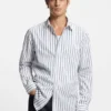 Randig skjorta i oversized-passform i bomullspoplin Randig skjorta i oversized-passform i bomullspoplin