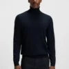 Rollneck-tröja i merinoull med smal passform