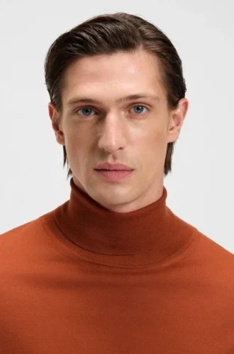 Rollneck-tröja i merinoull med smal passform