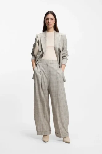 Rutiga byxor i oversized-passform i stretchull