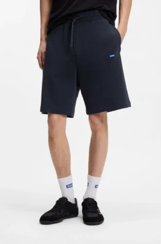 Shorts i bomullsfrotté med logotyp