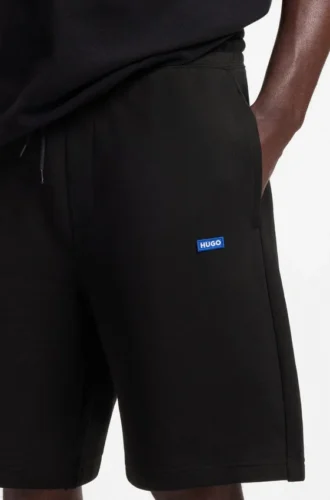 Shorts i bomullsfrotté med logotyp
