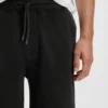 Shorts i bomullsfrotté med logotyp-patch