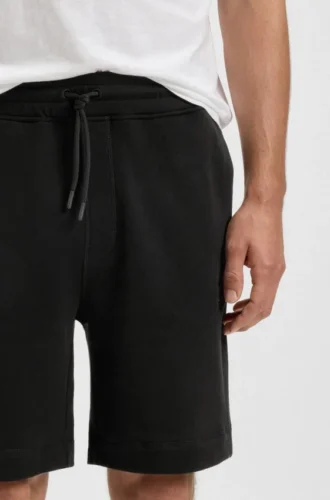 Shorts i bomullsfrotté med logotyp-patch
