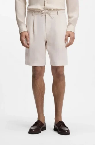 Shorts i linne med avsmalnande passform