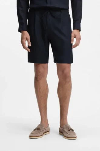 Shorts i linne med avsmalnande passform