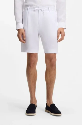 Shorts i linne med avsmalnande passform