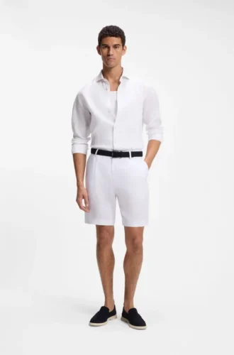 Shorts i linne med avsmalnande passform