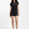 Shorts i stretchjersey med kontrasterande logotyp