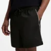 Shorts med kontrastpiping och vattenavvisande yta Shorts med kontrastpiping och vattenavvisande yta