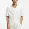 Skjorta i avslappnad passform i bomull med blomsterbroderier