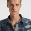 Skjorta i oversized-passform i denim med jacquardmönster
