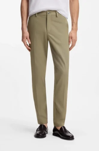 Slim fit-byxor i en stretchig bomullsblandning