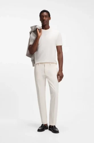 Slim fit-byxor i en stretchig bomullsblandning