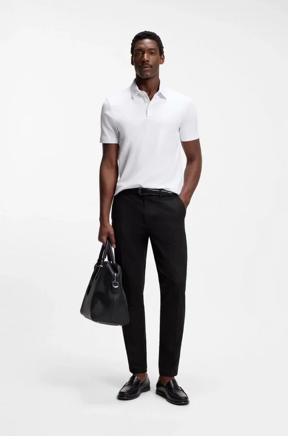 Slim fit-byxor i en stretchig bomullsblandning Slim fit-byxor i en stretchig bomullsblandning