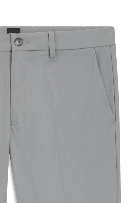 Slim fit-byxor i en stretchig bomullsblandning Slim fit-byxor i en stretchig bomullsblandning