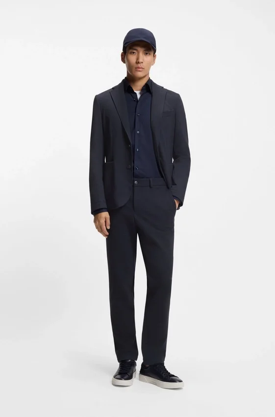 Slim fit-byxor i funktionsstretchtyg Slim fit-byxor i funktionsstretchtyg