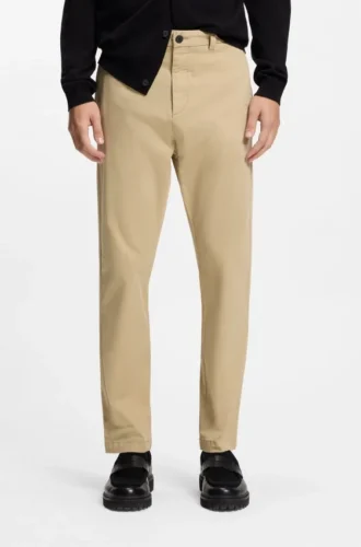Slim fit-byxor i stretchig bomullsgabardin