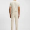 Slim fit-byxor i vattenavvisande stretchtyg Slim fit-byxor i vattenavvisande stretchtyg