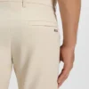 Slim fit-byxor i vattenavvisande stretchtyg Slim fit-byxor i vattenavvisande stretchtyg