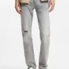 Slim fit-jeans i grå denim med slitna detaljer Slim fit-jeans i grå denim med slitna detaljer