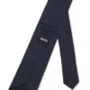 Slipsar i silke med jacquardmonogram