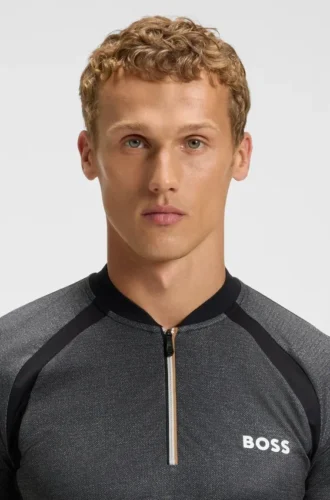 Smalpassad polotröja i mesh-jersey med dragkedja i halsen