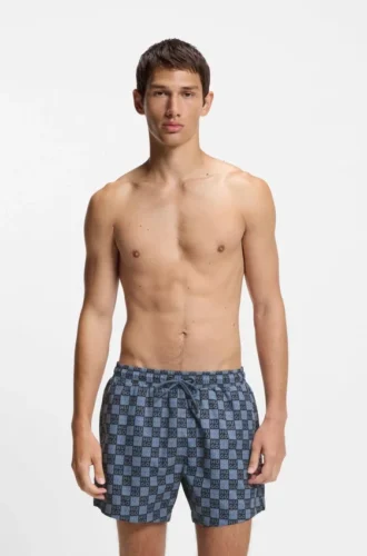 Snabbtorkande badshorts med rutmönster och staplade logotyper