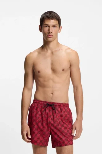 Snabbtorkande badshorts med rutmönster och staplade logotyper