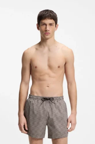 Snabbtorkande badshorts med rutmönster och staplade logotyper