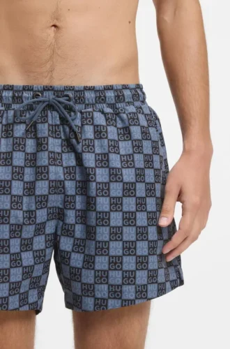 Snabbtorkande badshorts med rutmönster och staplade logotyper