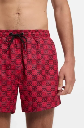 Snabbtorkande badshorts med rutmönster och staplade logotyper