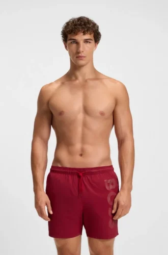 Snabbtorkande badshorts med vertikalt logotryck