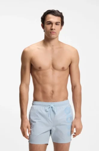 Snabbtorkande badshorts med vertikalt logotryck