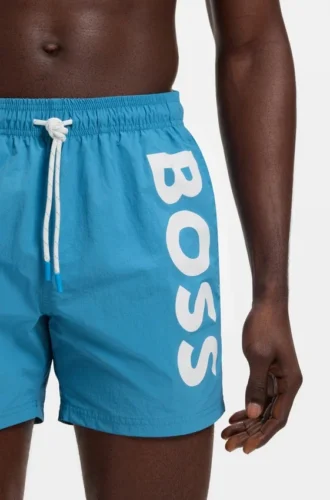 Snabbtorkande badshorts med vertikalt logotryck