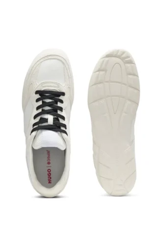 Sneakers i blandade material med öppen mesh