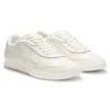 Sneakers i läder med präglad logotyp