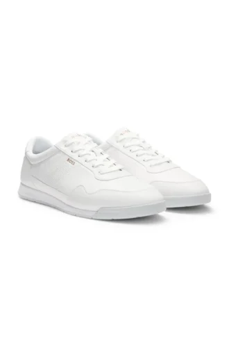 Sneakers i nappaläder med guldfärgat märke