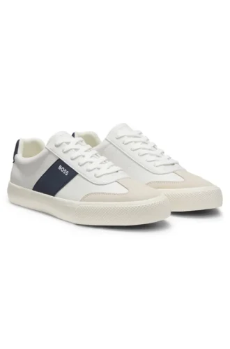 Sneakers med läderdetaljer i konstläder