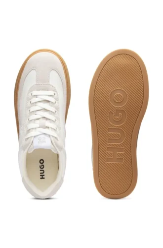 Sneakers med mocka-detaljer och låg profil