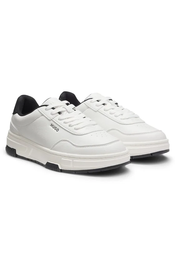 Sneakers med sicksack-sömmar i konstläder Sneakers med sicksack-sömmar i konstläder