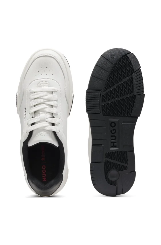 Sneakers med sicksack-sömmar i konstläder Sneakers med sicksack-sömmar i konstläder