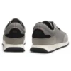 Sneakers med stickat ovandel och logotypflagga
