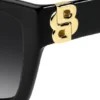 Solglasögon i svart acetat med Double B-monogram